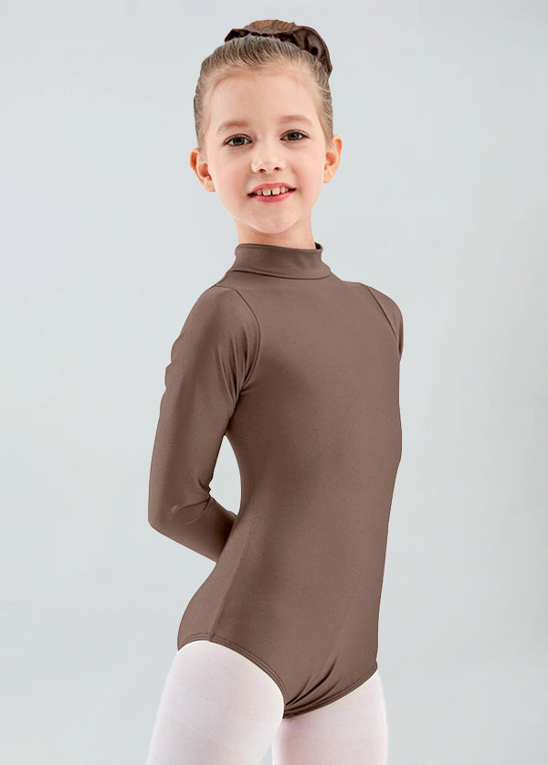 Young girl wearing a brown long-sleeve top against a light gray background