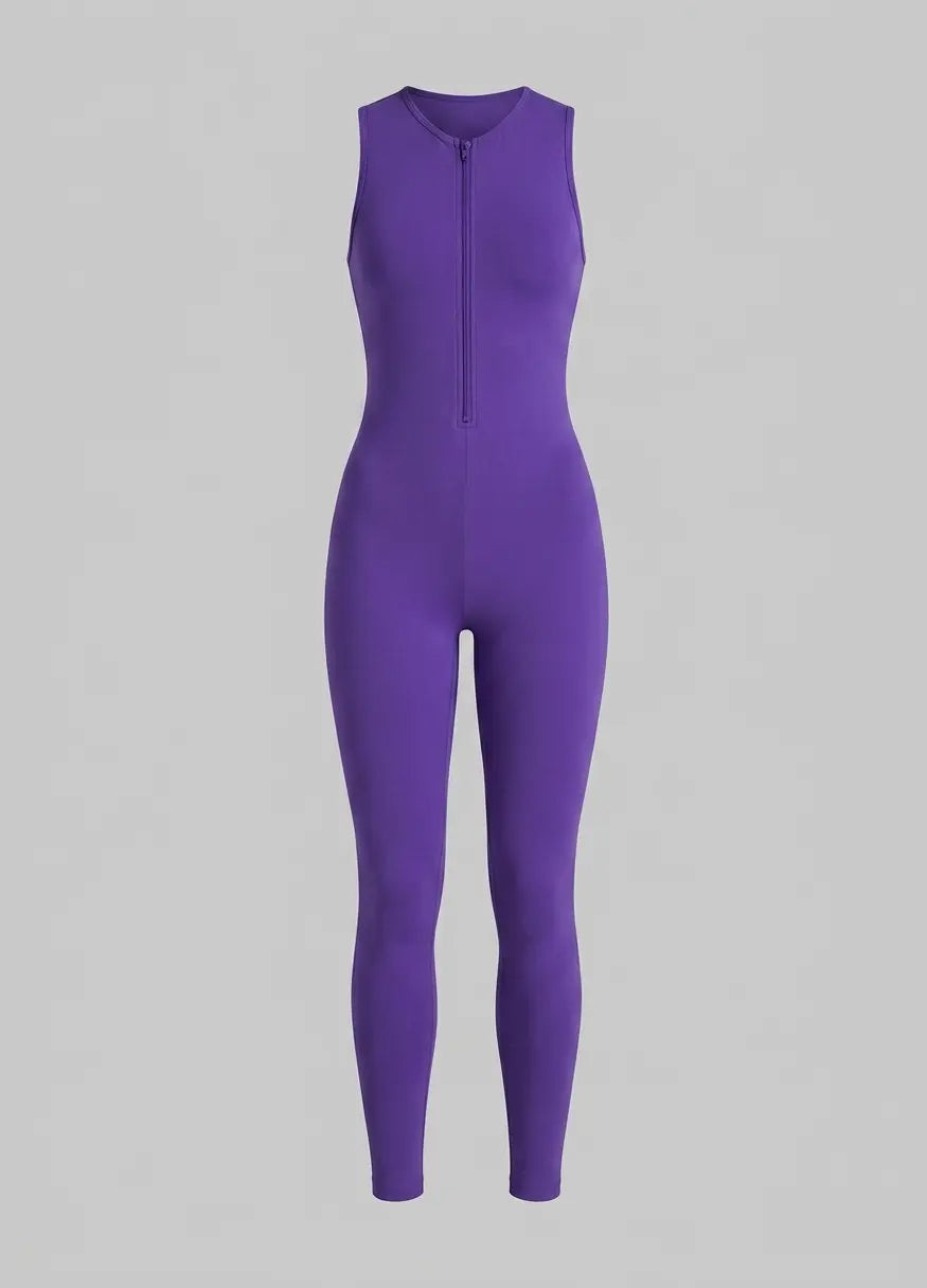 A sleeveless purple one-piece jumpsuit with a front zipper, shown on a neutral gray background.